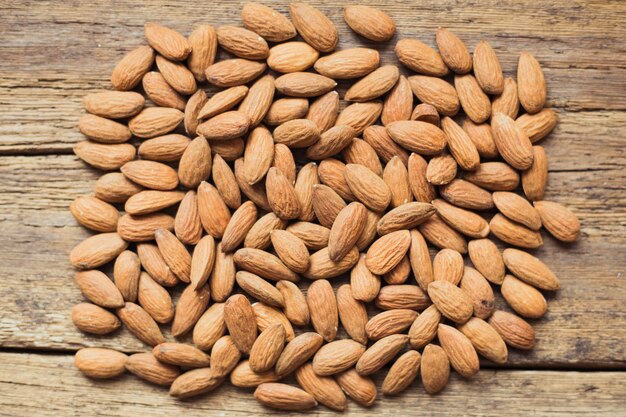 Almonds on wooden board