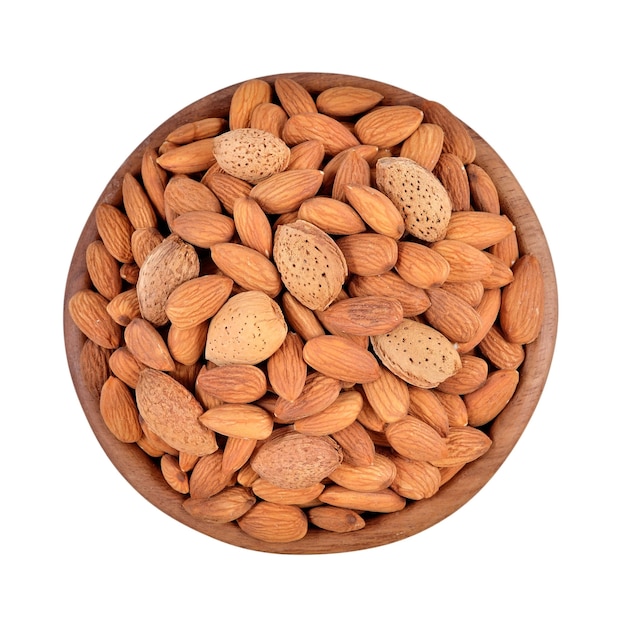 Almonds in a wooden bowl on a white background