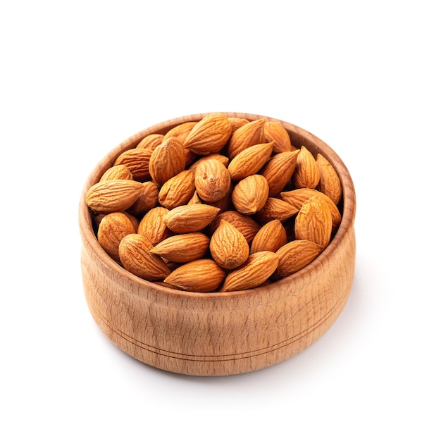 Almonds in a wooden cup White background