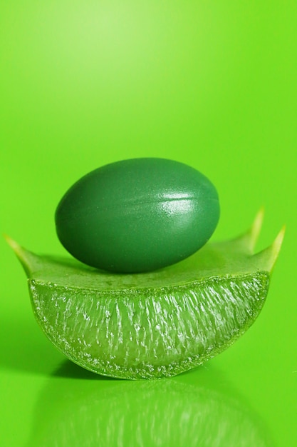 aloe vera.Organic natural aloe extract in green capsules.