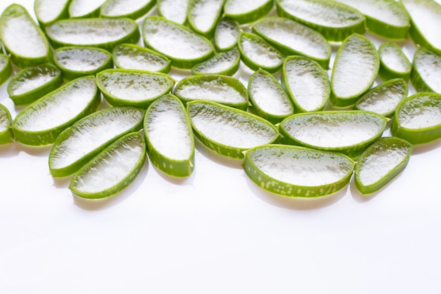 Aloe vera slices on white background