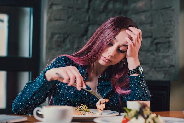 Alone woman in cafe sad beautiful girl attractive bored woman in restaurant