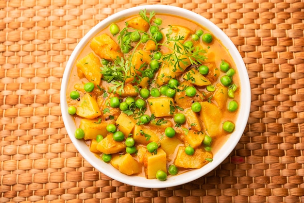 Aloo mutter is a Punjabi dish from the Indian subcontinent which is made from potatoes and peas in a spiced creamy tomato based sauce