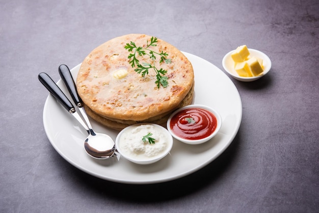 Aloo paratha or gobi paratha also known as Potato or Cauliflower stuffed flatbread dish originating from the Indian subcontinent