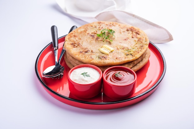 Aloo paratha or gobi paratha also known as Potato or Cauliflower stuffed flatbread dish originating from the Indian subcontinent