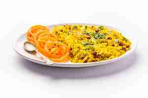 Photo aloo poha with jalebi snack combination also called imarti and kande pohe