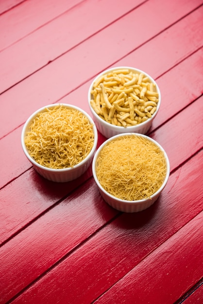 Aloo sev or namkeen snack is made from mashed potatoes, chickpea flour and spices, selective focus