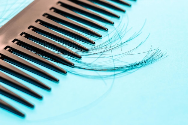 Alopecia hair loss concept fallen hair on combs from disease