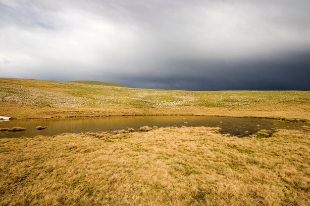 Alpine mountain lake landscape, colorful nature view, Georgian lake, travel destination, hiking place.