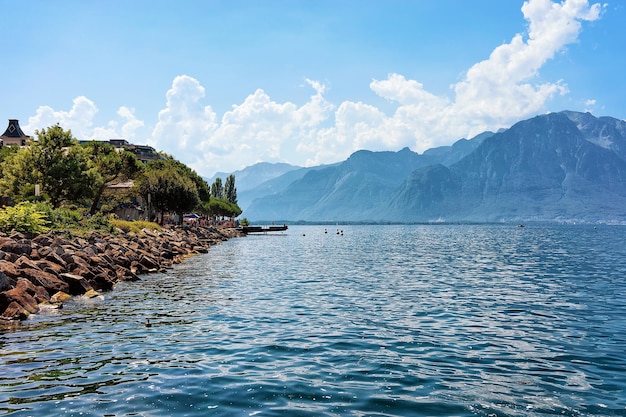 Alps mountains and coastline of Geneva Lake of Montreux, Swiss Riviera