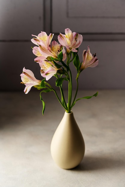 Alstroemeria pink flowers abstract moody floral background