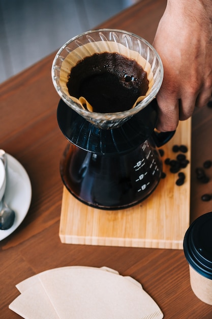 Alternative coffee brewing method, using pour over dripper and paper filter.