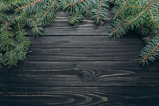 Altijdgroene Kerstboom op houten de vakantieconcept van de raads horizontaal weergave.