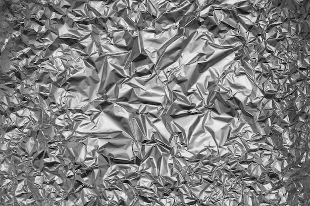 Photo aluminium foil texture background crumpled silver