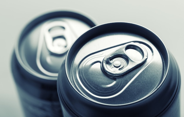 Aluminum cans closeup picture isolated on gray