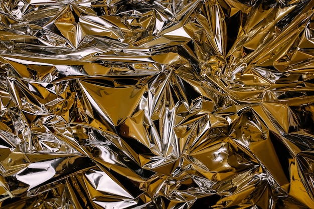 Aluminum crumpled foil texture background Part of wrapping paper for gifts