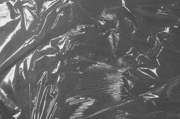 Фото Фон из алюминиевой фольги фототекстура случайно смятого листа алюминиевой фольги