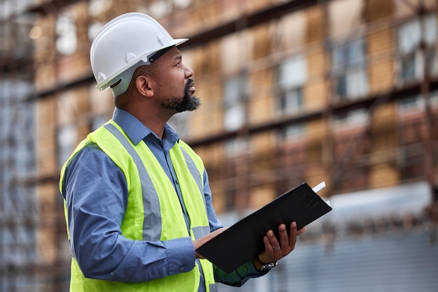 Always make sure of the rules Shot of a contractor filling out paperwork at a construction site