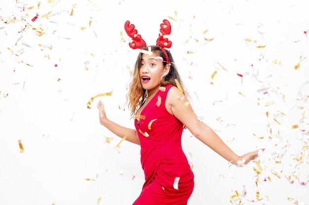 Amazed lady having fun at Christmas party