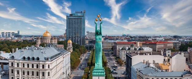 Amazing aerial view of the statue of liberty milda in riga