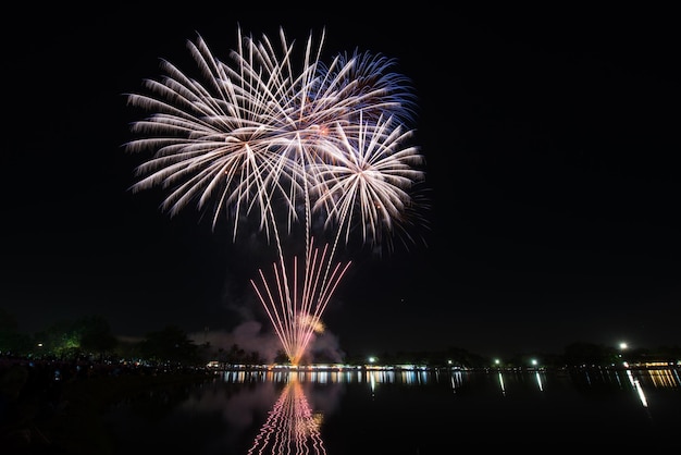 Amazing Beautiful firework on black background for celebration anniversary merry christmas eve and happy new year