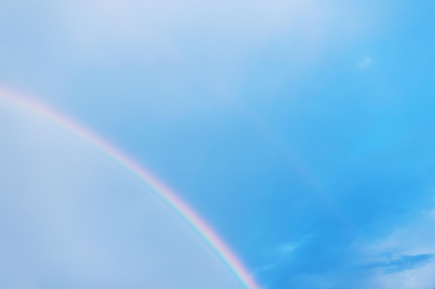 Amazing blue sky with double rainbow