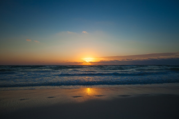 Amazing colorful sunset on the beach resort  in Mexico