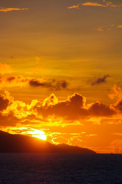 Amazing colorful sunset on an exotic beach in Seychelles