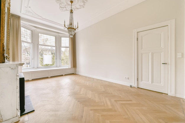 Amazing design of an empty room with a black fireplace