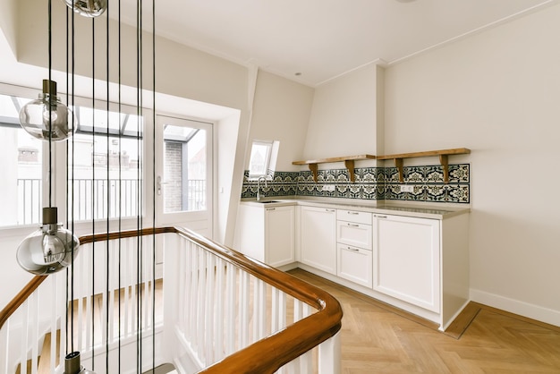 Amazing design of a room with a white staircase