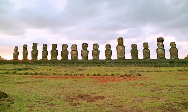 Amazing Gigantic 15 Moai statues of Ahu Tongariki ceremonial platform at sunrise Easter Island Chile