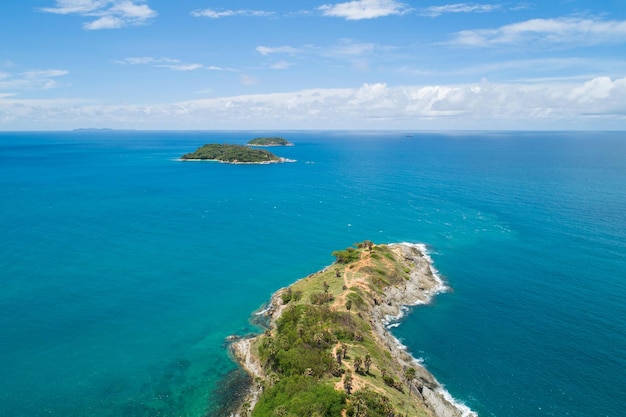 Amazing landscape nature scenery view of beautiful tropical sea\
with sea coast view in summer season image by aerial view drone top\
down high angle view located at laem promthep phuket thailand