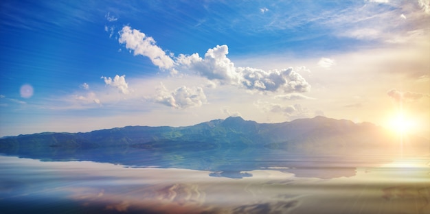 Amazing landscape with mountains lake and blue sky with clouds exploring armenia