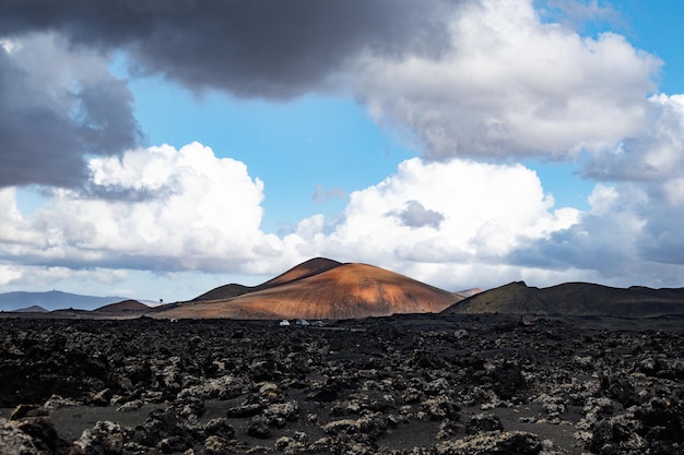 Amazing panoramic landscape of volcano craters in timanfaya national park popular touristic attracti