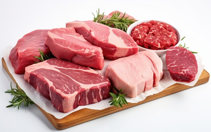 Amazing Pieces of Fresh Meat on a Wood Tray Isolated on White Background