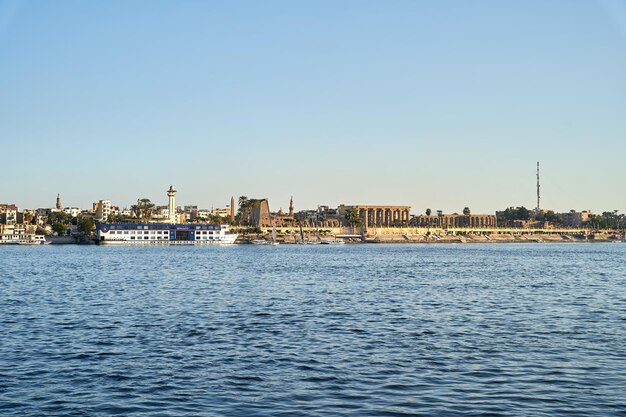 Photo amazing shoot of nile river from aswan with sail boats sailing in it