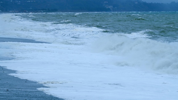 An amazing shot of rough sea waves crashing on the sea coastline adjara georgia static view