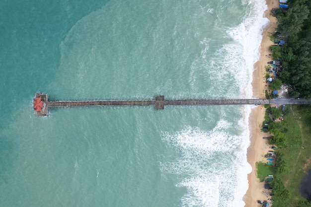 Amazing small bridge in to the summer sea High angle view Beautiful sea surface in sunny day Beautiful seascape nature landscape