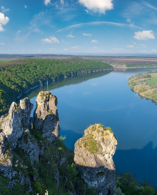 Amazing spring view on the Dnister River Canyon with picturesque rocks fields flowers This place named Shyshkovi Gorby Nahoriany Chernivtsi region Ukraine