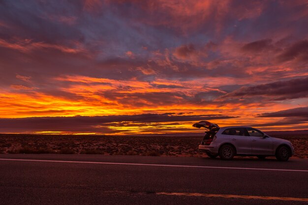 Amazing sunrise with pink, gold and magenta colors near Monument Valley, Arizona, USA.