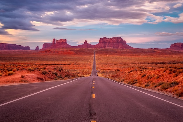 Amazing sunrise with pink, gold and magenta colors near Monument Valley, Arizona, USA.