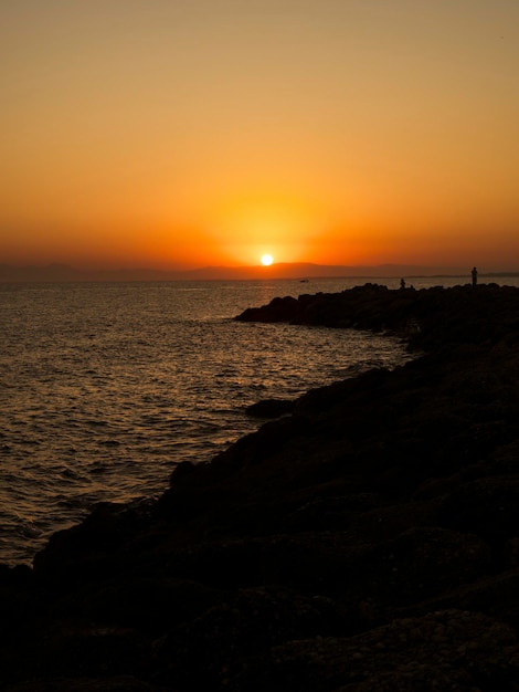 Amazing sunset on the beach in summer