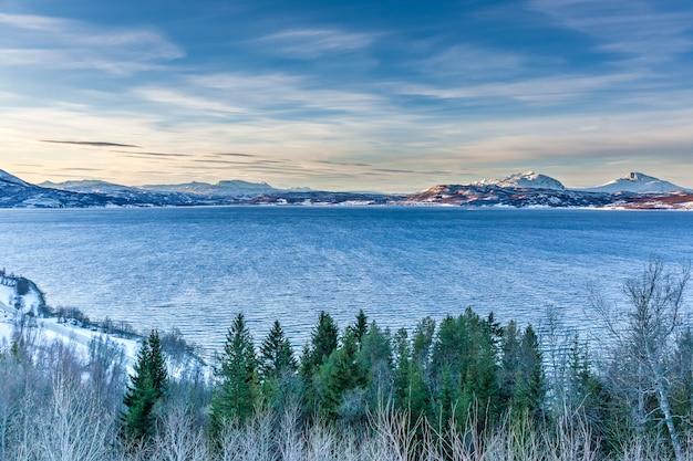 Amazing Sunset during blue hours Over Mountain And Fjord, Winter Landscape, Norway