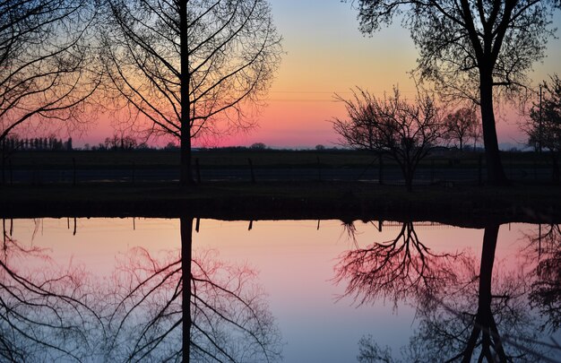 amazing sunset on the Muzza river in the countryside