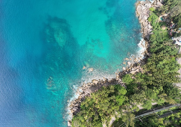 Amazing top view seashore Aerial view of Tropical sea in the beautiful Phuket island Thailand Travel and business tour website background concept