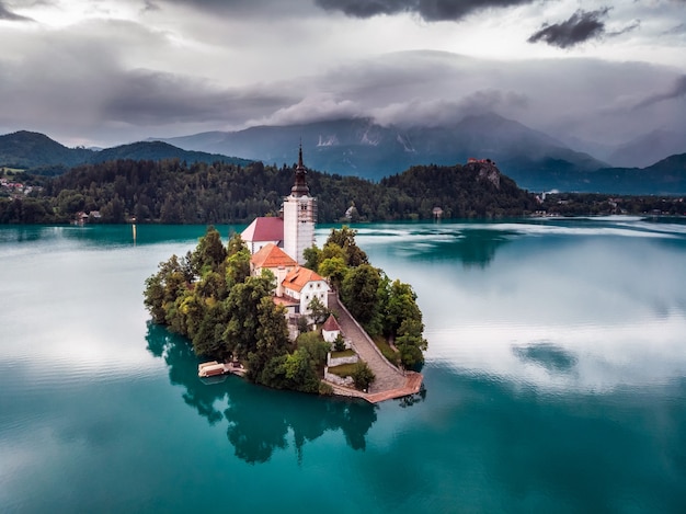 Amazing View On Bled Lake, Island,Church And Castle With Mountain Range