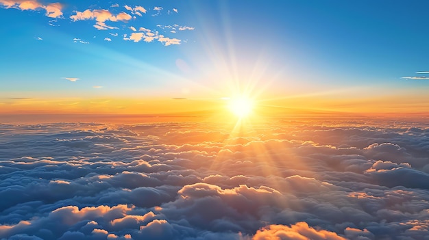 Amazing view of the sunrise above the clouds The soft light of the sun and the deep blue sky create a beautiful and peaceful scene