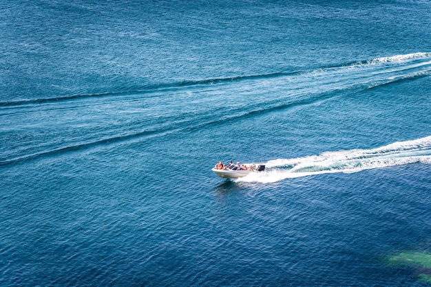 Amazing view to yacht and clear dark blue water summer paradise