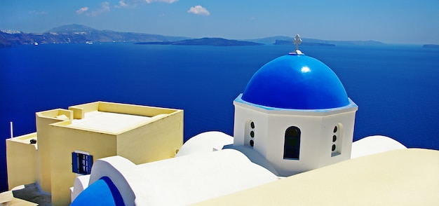 Amazing views of Santorini. Traditional churches and sea . Greece travel