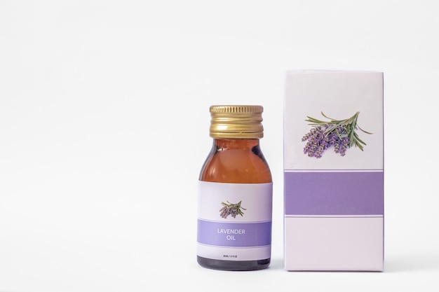 amber bottle of lavender essential oil with box isolated on white background